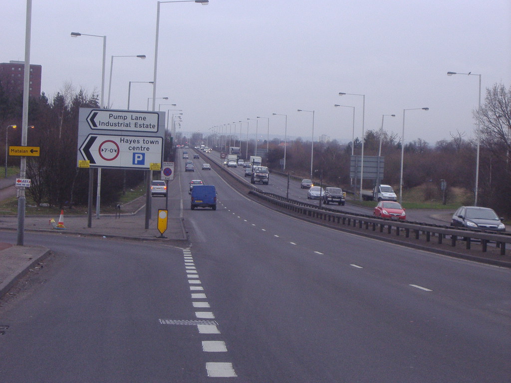 Finished dual carriageway with fresh road markings and signage